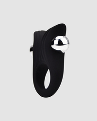 Vibrant close-up of the Loving Joy Vibrating Cock Ring highlighting its unique textured surface for enhanced stimulation.