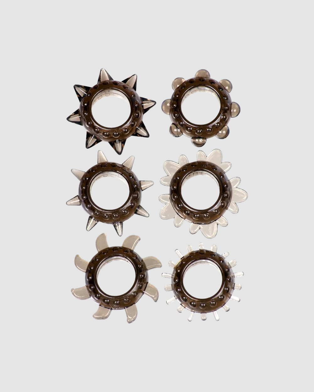 Me You Us textured waterproof cock ring with varied, stretchy designs for enhanced stimulation, shown on a product display.