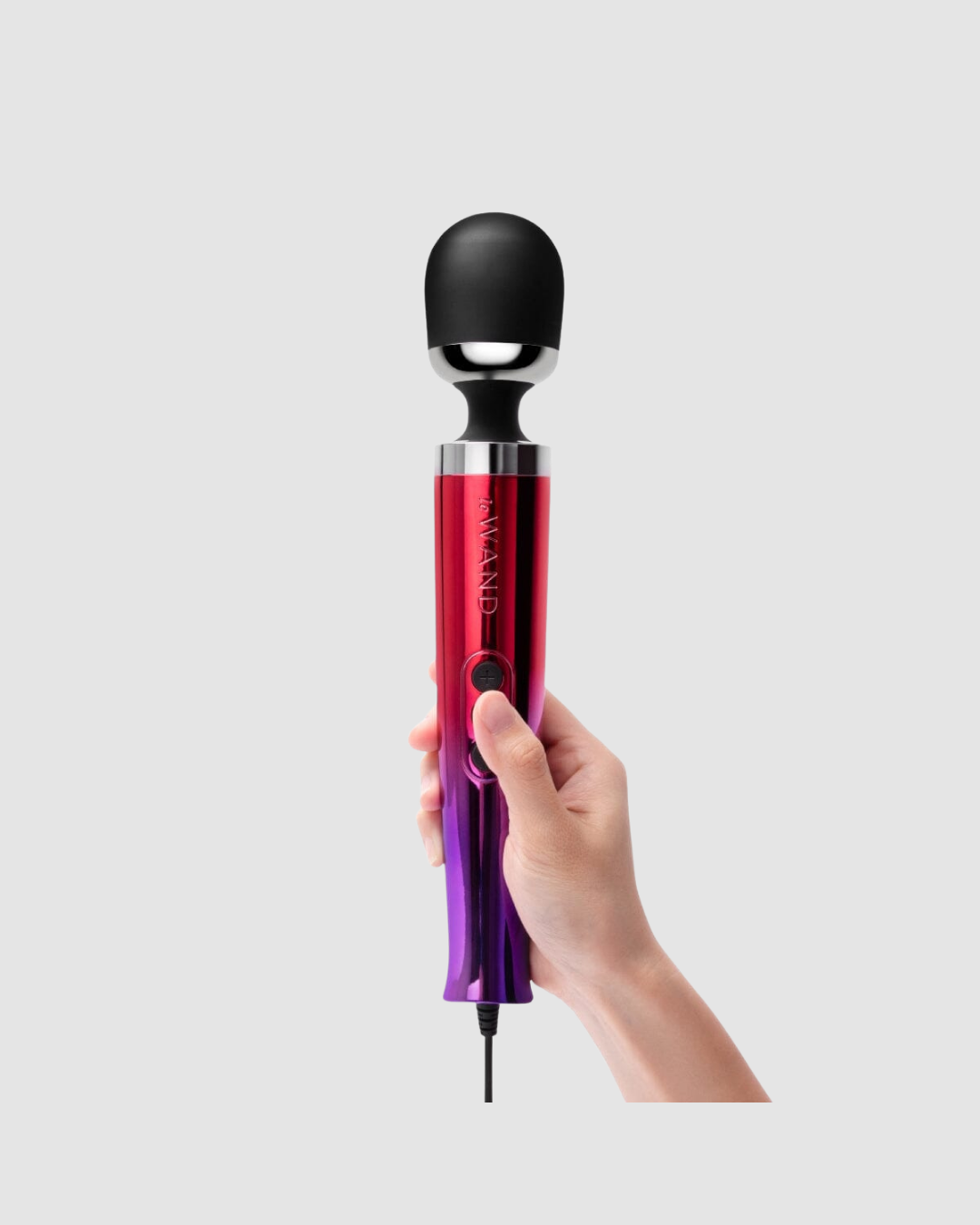 Le Wand Ombre Diecast Luxury Vibrating Massager showcasing its ergonomic design and chic silver finish, the epitome of a luxury vibrating massager.