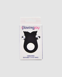 Elegant display of the Loving Joy Vibrating Cock Ring with included batteries, ready for use in intimate moments of ecstasy.