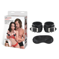 a pair of black leather cuffs and a pair of black leather cuffs