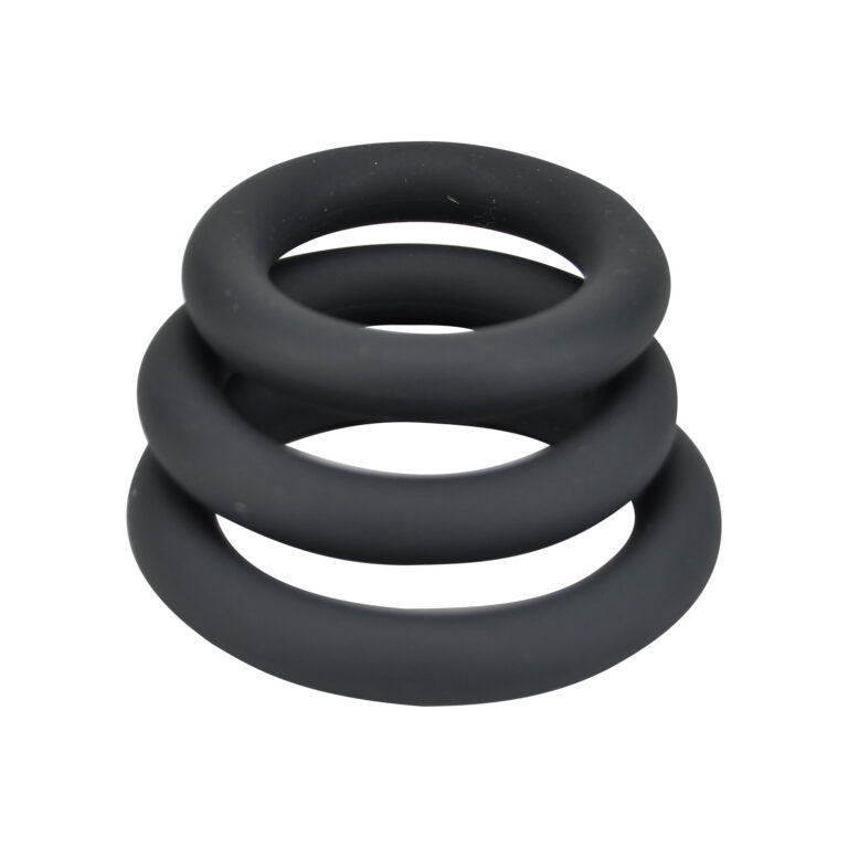 Three grey Loving Joy thick silicone cock rings set, stretchy and smooth for enhanced intimacy and comfort.