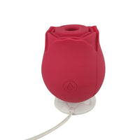 a red device plugged into a white cord