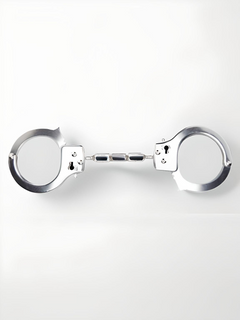 Sophisticated Heavy Duty Handcuffs with a smooth chrome design, crafted for ultimate comfort and erotic exploration.