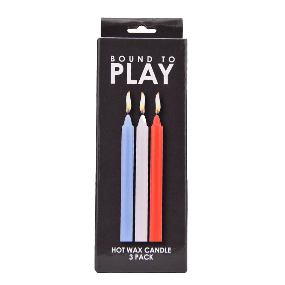 a pack of three candles with the words, bound to play