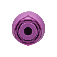 a purple plastic object on a white background