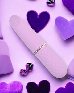 Nauti Petites 10-speed bullet vibrator with textured tip, USB rechargeable, discreet 4.25-inch design, featuring heart accents.