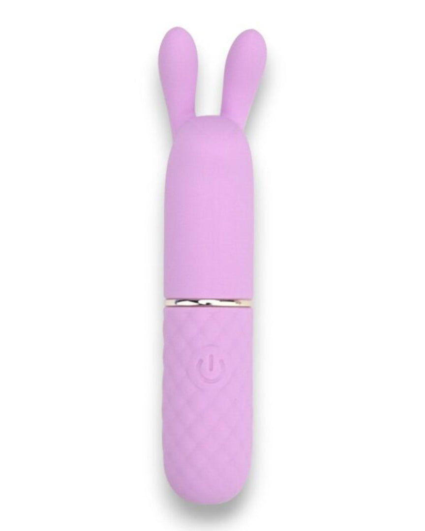 a pink bunny shaped device is shown on a white background