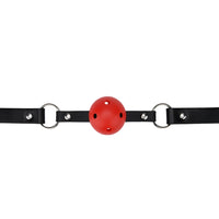 Refined black and red breathable ball gag with ventilated ball and elegant strap system, ideal for BDSM play.