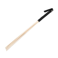 Close-up view of the Bound to Please Multi-Strand Spanking Cane highlighting the natural rattan material and sophisticated PU handle.
