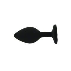 Black rubber butt plug on a white background