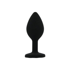 Black silicone butt plug on a white background