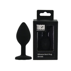 Black silicone butt plug with packaging on a white background