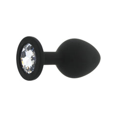 Black anal plug with a crystal on a white background