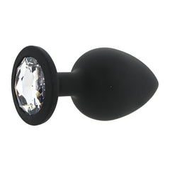 Black anal plug with a crystal accent on a white background
