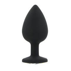 Black silicone butt plug on a white background