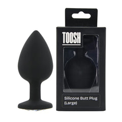 Black silicone butt plug with packaging displaying 'TOOSH' brand on a white background