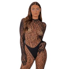 Model showcasing the Lace by LJ Gloved Leopard Print Catsuit Black with its bold open back and gloved sleeves for a stunning silhouette.
