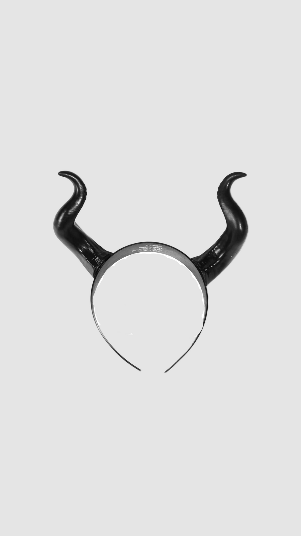 Neon-colored Halloween headband with goth ox horn shapes, perfect for parties and music festivals, by Scandals.