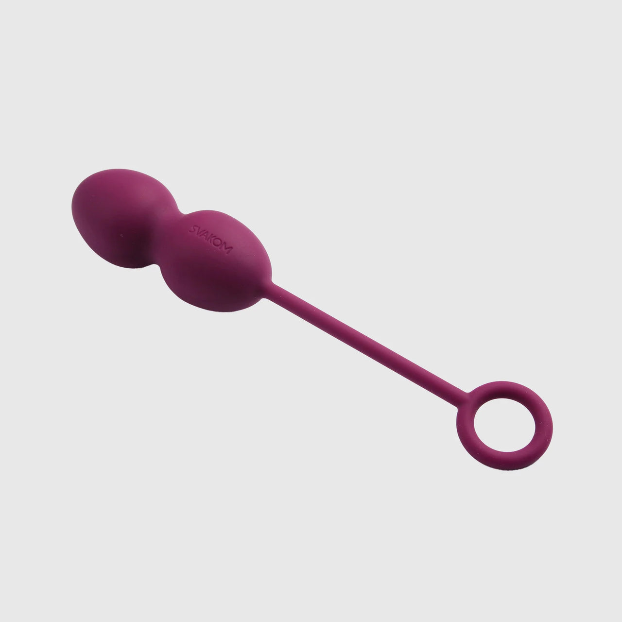 a pair of pink balls and a round handle