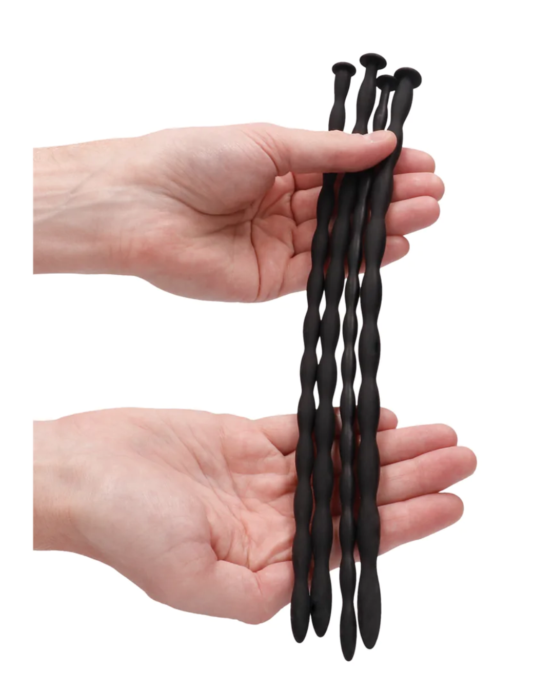 a person holding Silicone Spiral Screw Advanced Urethral Sounding Plugs in 4 Sizes