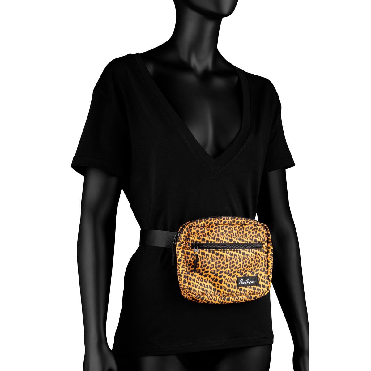 a female mannequin wearing a black shirt and a leopard print fanny bag