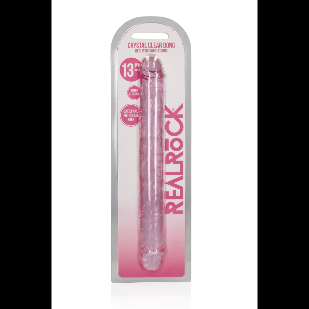 a pair of pink plastic toothbrushes in a packaging