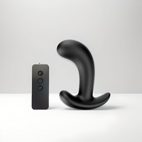 Thumbnail for a remote control sitting next to a black object
