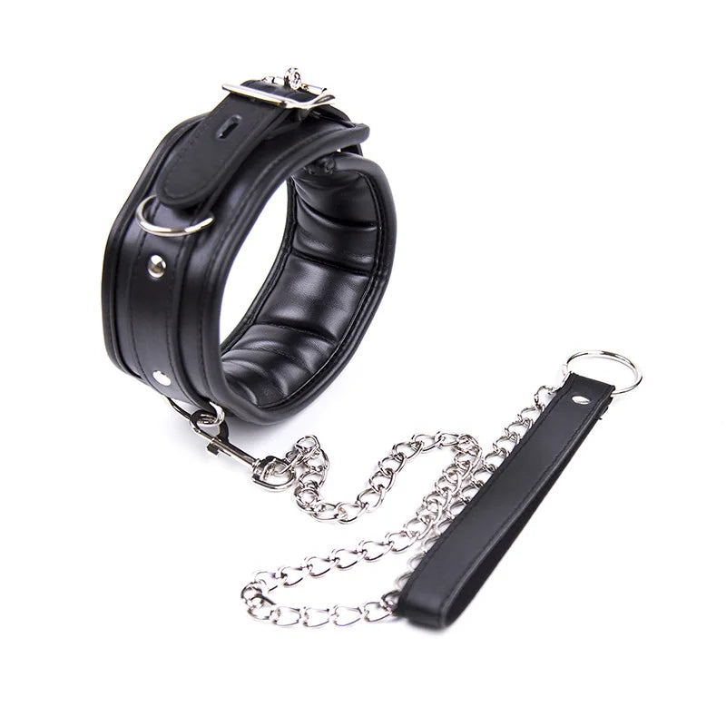 a black leather collar with a chain attached to it