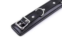 Thumbnail for a black leather belt with a metal buckle