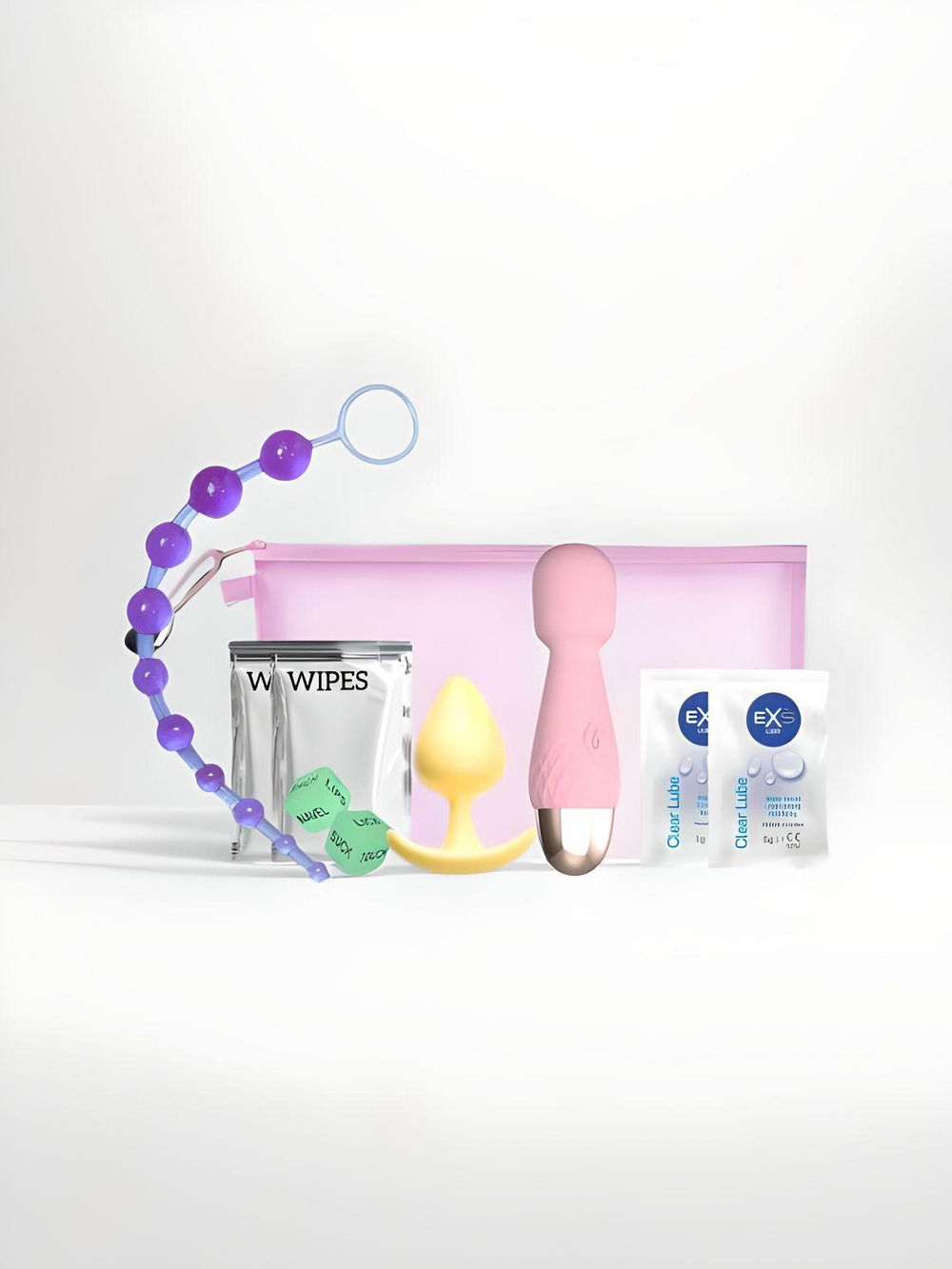 Rechargeable mini massager and sensual accessories in a Weekend Couples Toy Kit by Own Brand, designed for intimate pleasure.