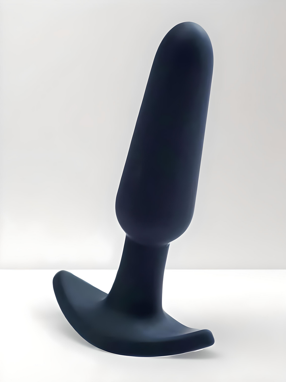 Black VēDO Bump rechargeable anal vibe with soft silicone, 10 vibration modes, waterproof design, from Vedo, shown from a side perspective.