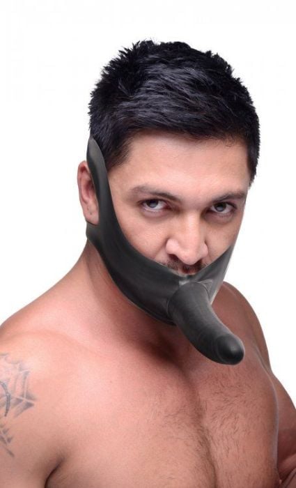 Master Series face gag with adjustable stretchy latex strap and dildo mouth gag for BDSM role play.