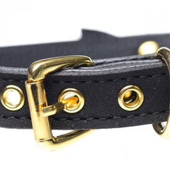 Luxury gold and pink kitty collar with bell from Master Series, featuring a submissive feline aesthetic and playful design.