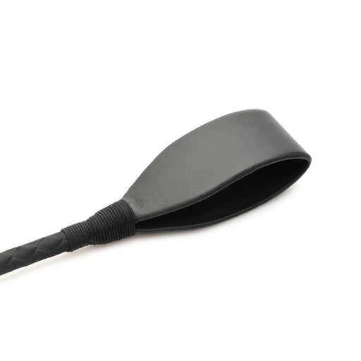 a black spatula with a black handle on a white background