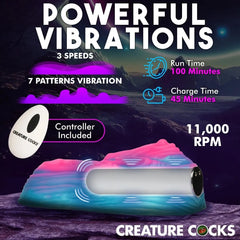 Fantasy vulva grinder with pink teal and purple folds