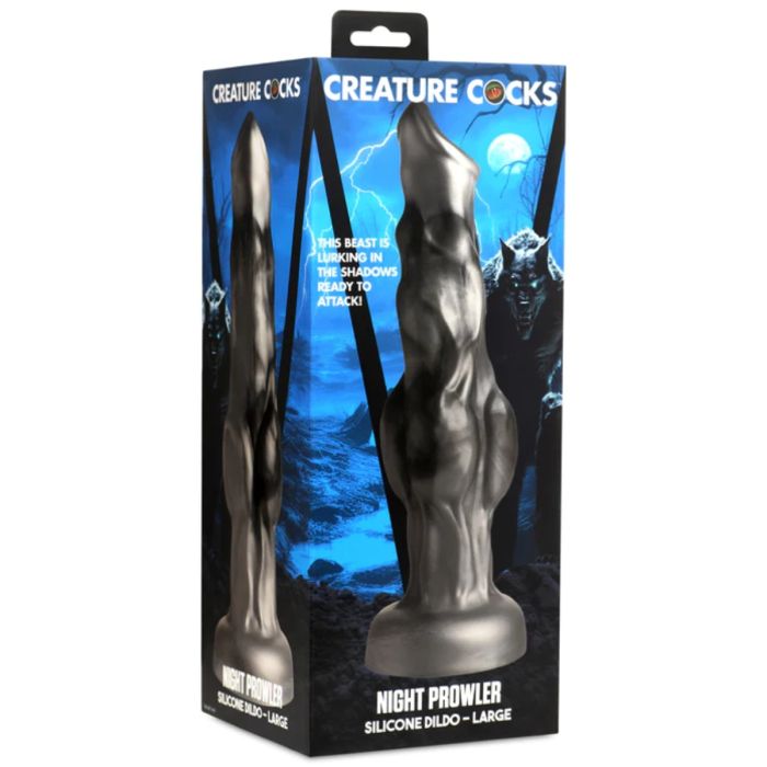 a black and silver statue in a box