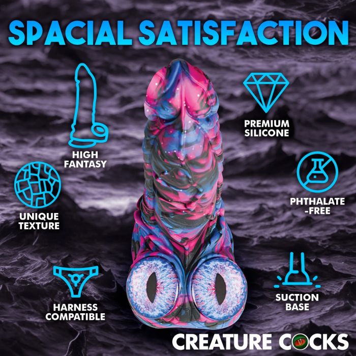 The Creature Cocks Alienoid Silicone Dildo displayed in a sophisticated setting, highlighting its cosmic colours and superior craftsmanship in body-safe silicone.