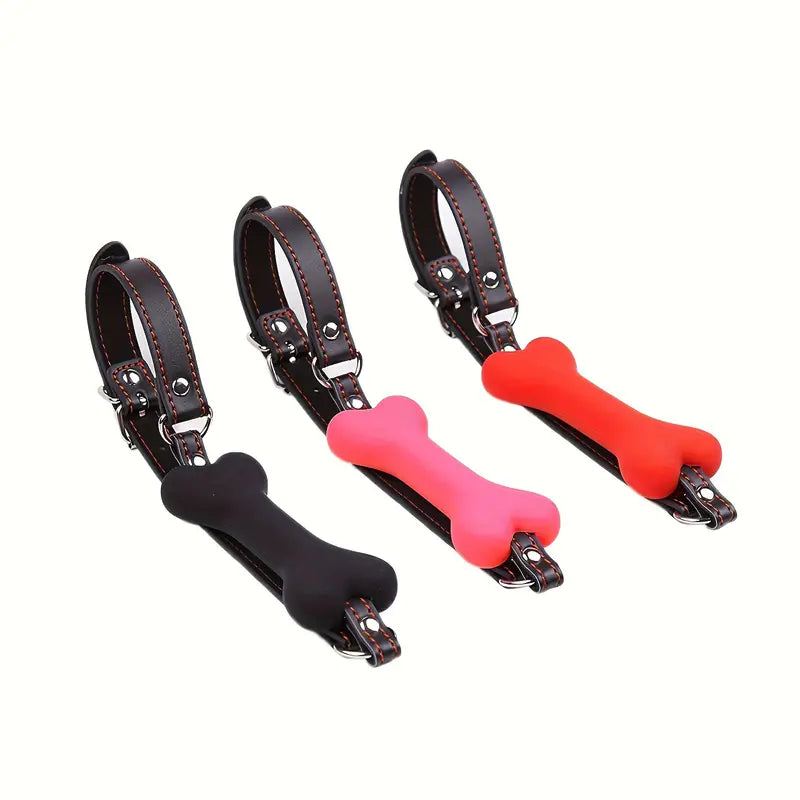 a set of three different colored dog leashes