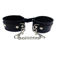 Thumbnail for a pair of black leather cuffs with chains