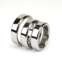 Thumbnail for a couple of silver rings sitting on top of each other