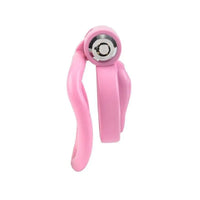 Elegant Pink Fake Vagina Sissy Chastity Cage displayed with its secure locking mechanism, ideal for fetish play.