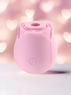 a close up of a pink object on a table