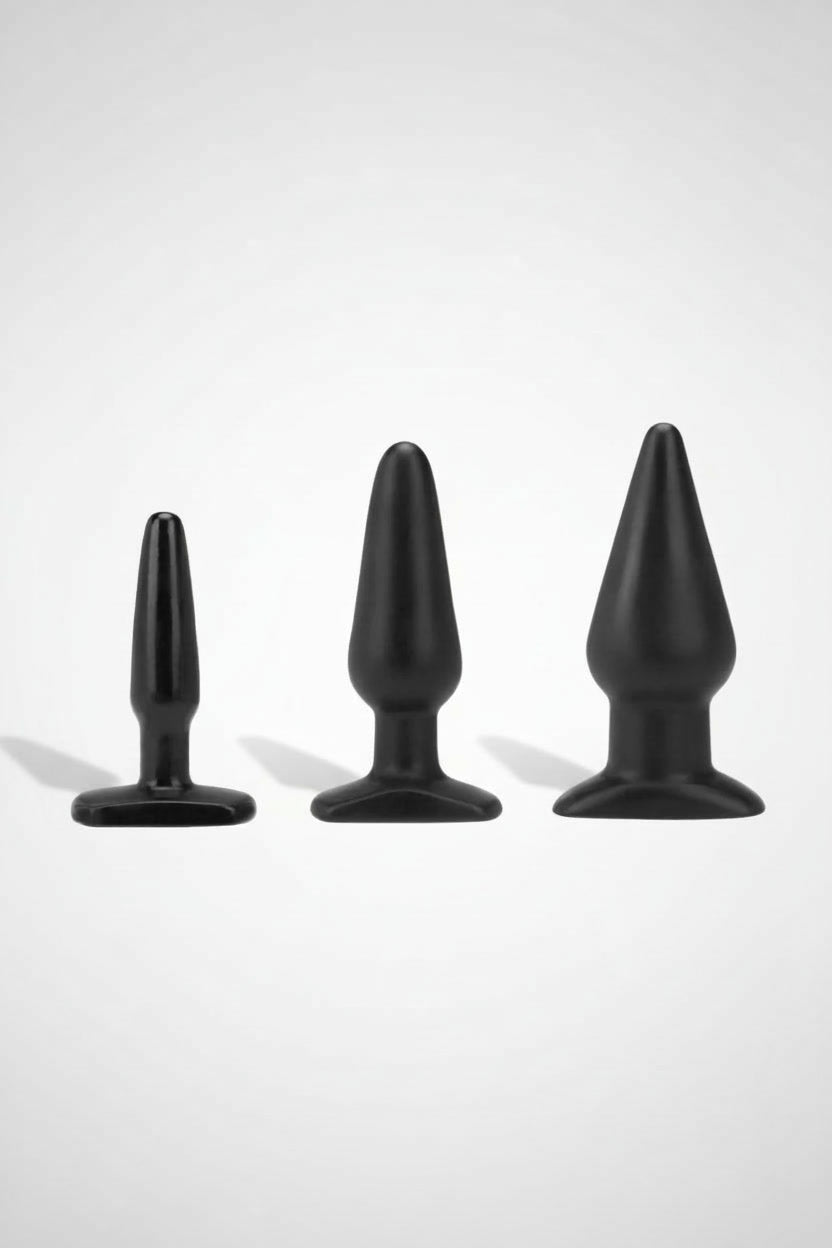 Me You Us black butt plug, smooth and body-safe, designed for beginners, shown in a close-up image with a sleek, tapered shape.