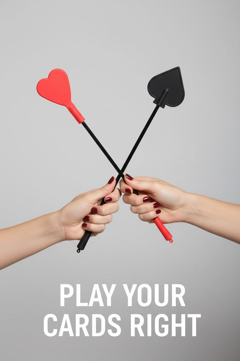 Fetish Fantasy silicone heart crop flapper with red and black design held in a woman's hands, perfect for fetish exploration.