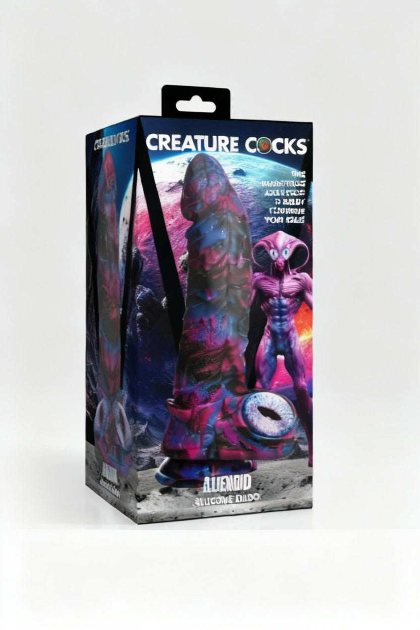 Creature Cocks Alienoid Silicone Dildo, 8.8 inch textured cosmic rod with suction base, shown in product box on light grey background.