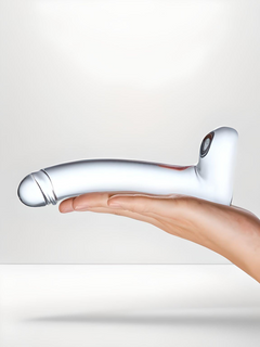 Refined Glas Realistic Curved Glass G-Spot Clear 7 Inch Dildo held gently in hand, illustrating its perfect size and shape for a sensual experience.