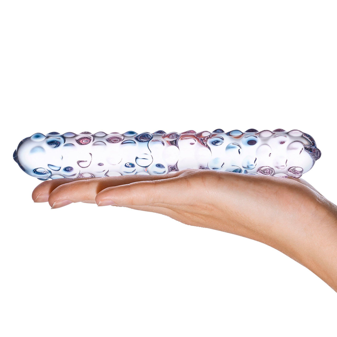 a hand holding a glass tube with bubbles on it