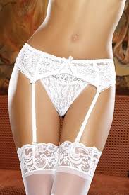 Dreamgirl white lace garter belt with scalloped hem, adjustable straps, made of nylon and spandex, designed for sultry nights.