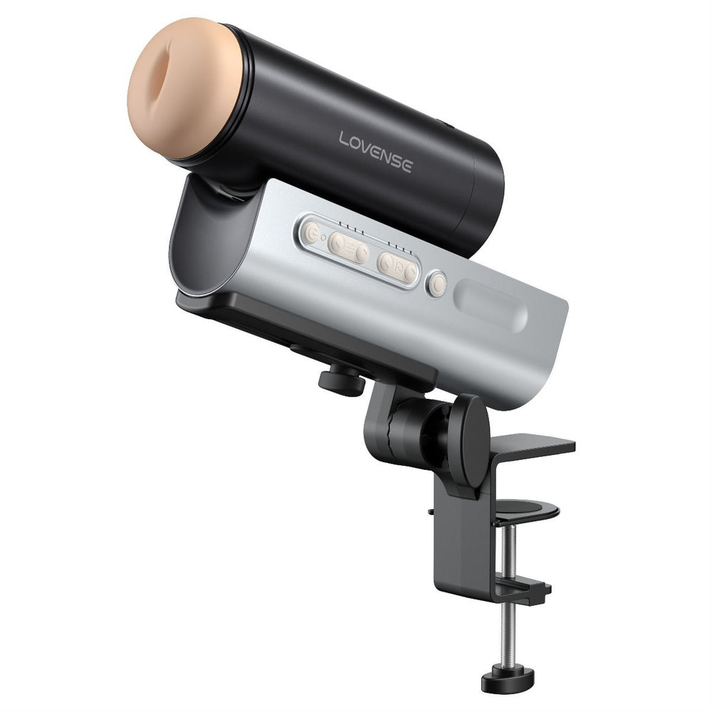 Lovense Solace Pro app-controlled masturbator with desk mount, AI sync, and 300 strokes per minute, hands-free use.